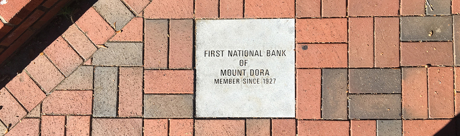 brick paver with First National Bank of Mount Dora dates