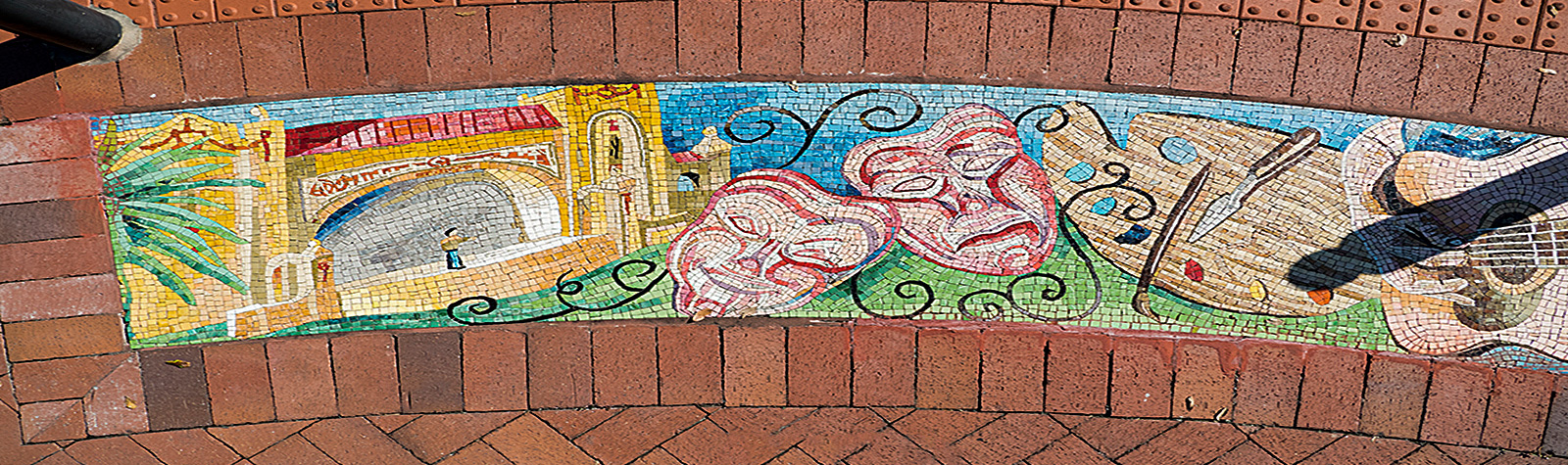 street mosaic illustrating the arts
