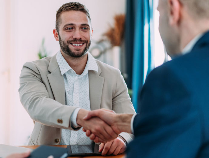 two businessmen shaking hands